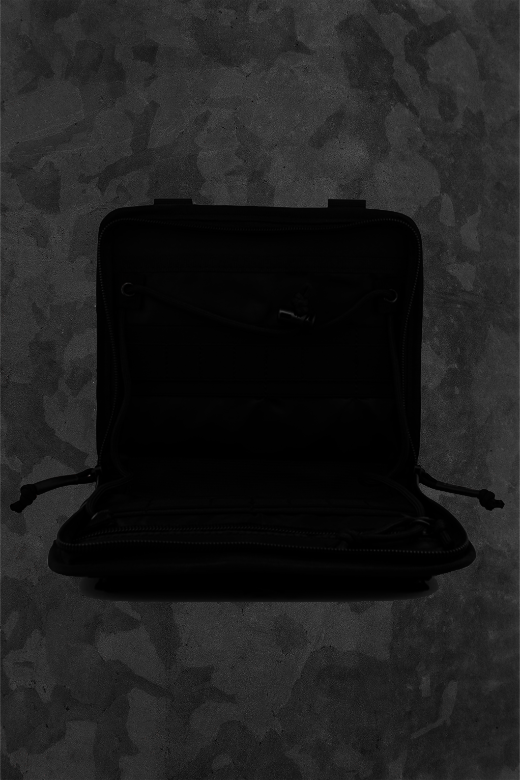 Silhouette of a suitcase on a textured gray background
