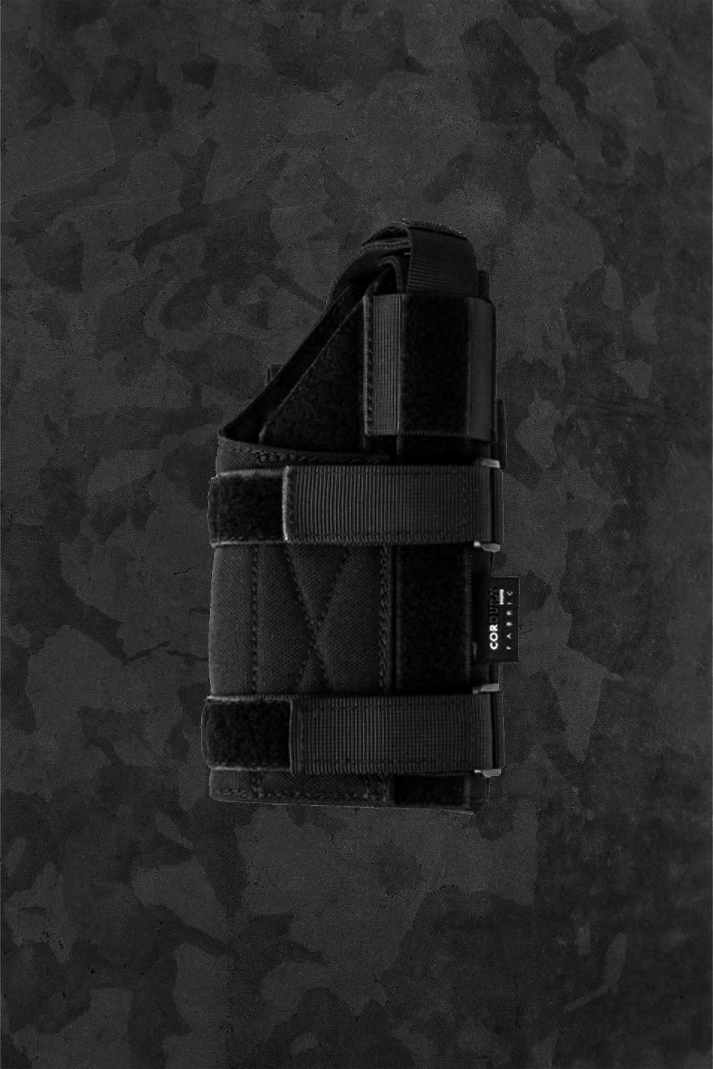 Black tactical gun holster on a camouflage-patterned background