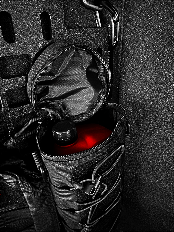 Black tactical pouch with a red water bottle inside, attached to an aircrafts cargo area.